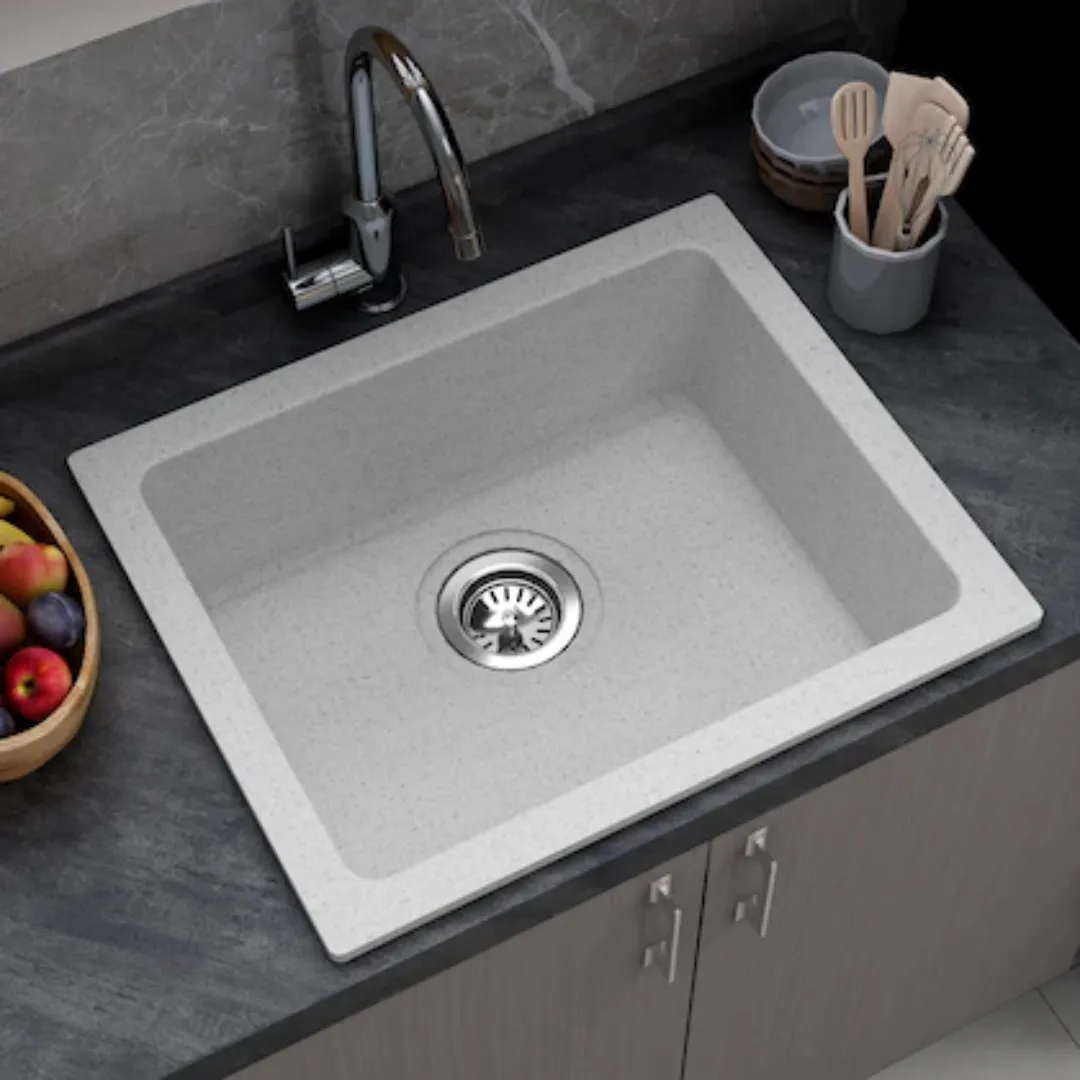 White quartz single bowl sink with sleek finish and modern countertop integration, designed for space-saving kitchens by quartz kitchen sink manufacturers