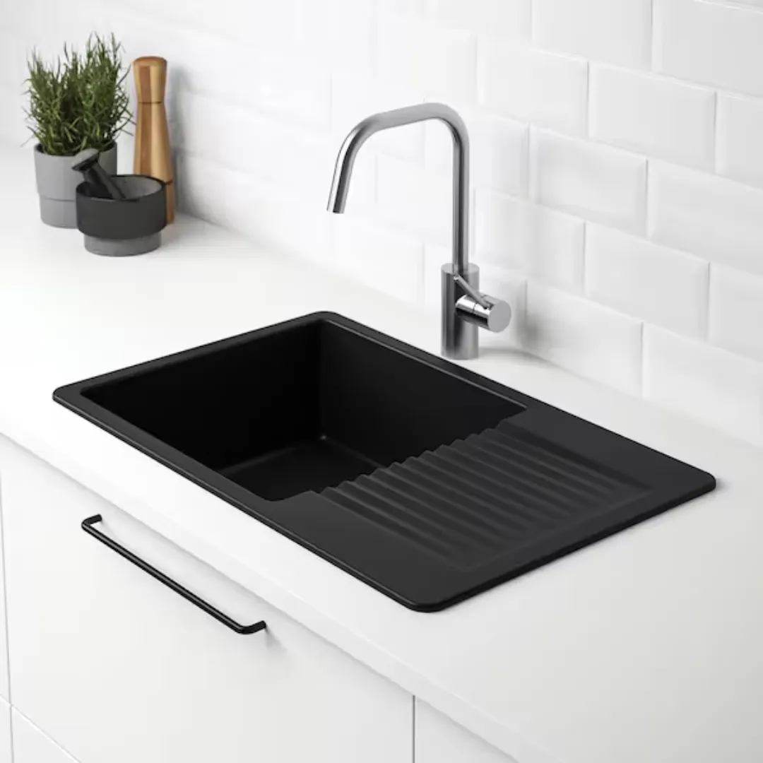 Matte black quartz kitchen sink with built-in ribbed drainboard, ideal for drying utensils and produce in compact kitchens by quartz kitchen sink manufacturers