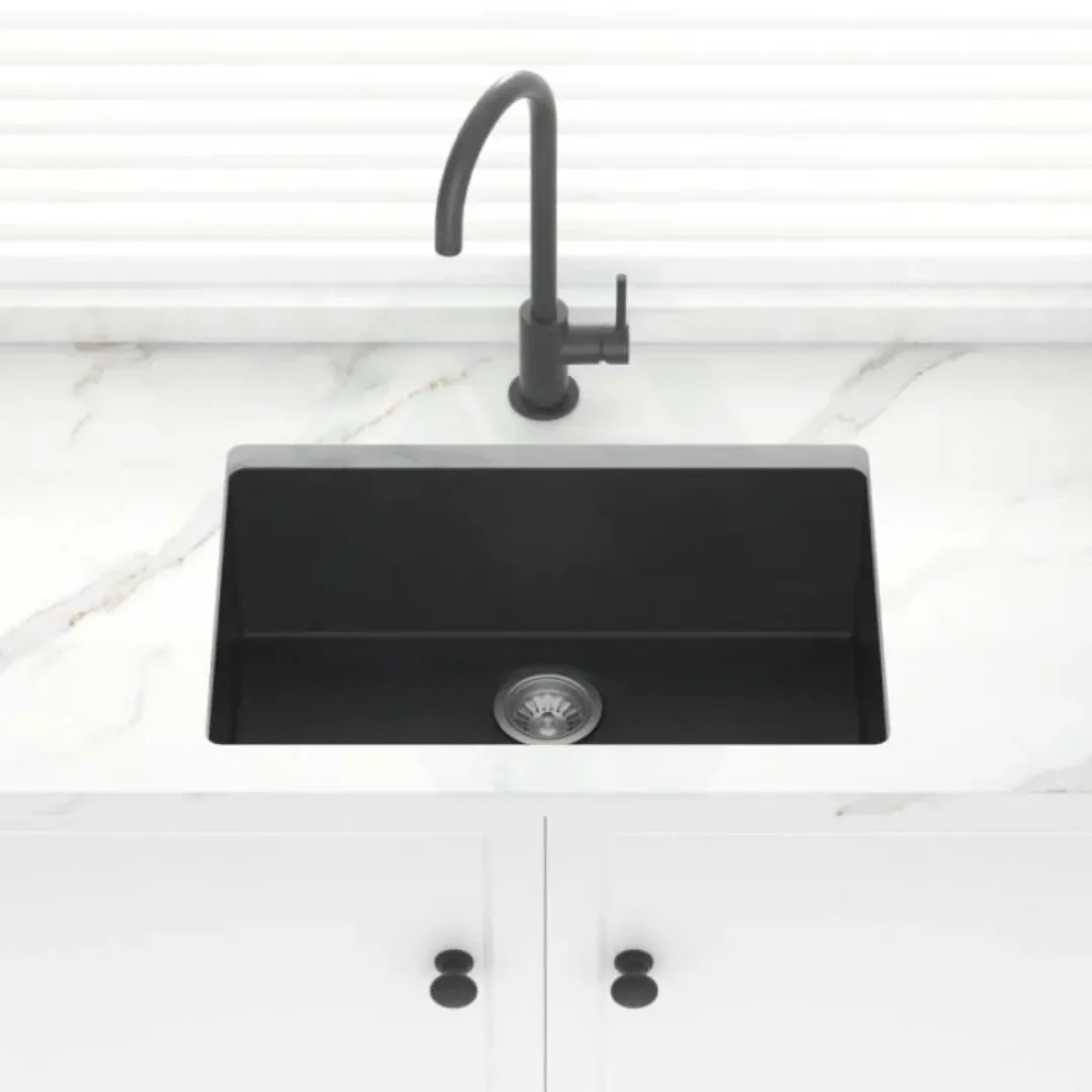 Modern black quartz sink with under-mount installation and compact dimensions, designed for contemporary luxury kitchens by quartz sink manufacturers