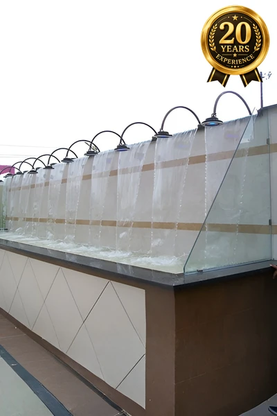 Decorative cascading water wall fountain showcasing 20+ years of expertise from trusted fountain manufacturers and water fountain suppliers for commercial and architectural projects